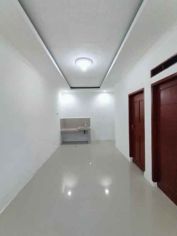 dijual rumah jalan haji kimah