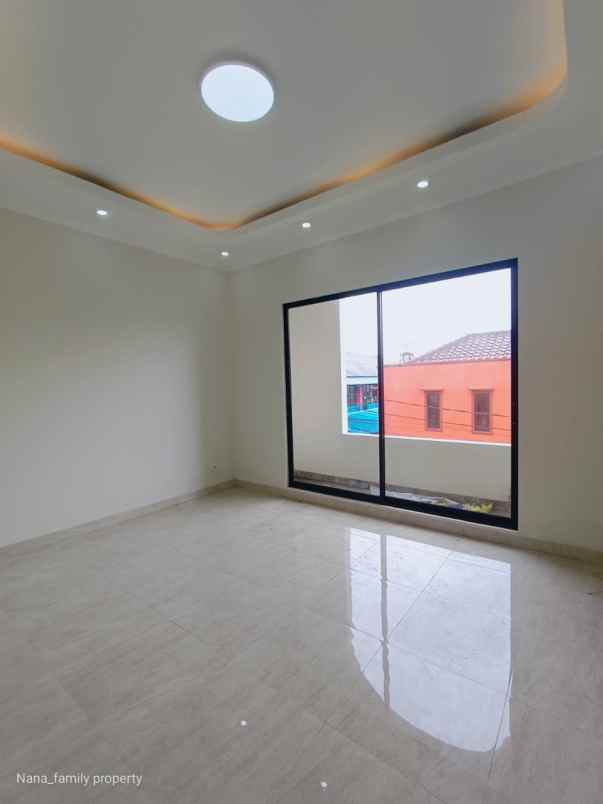 dijual rumah jalan raya kelapa dua