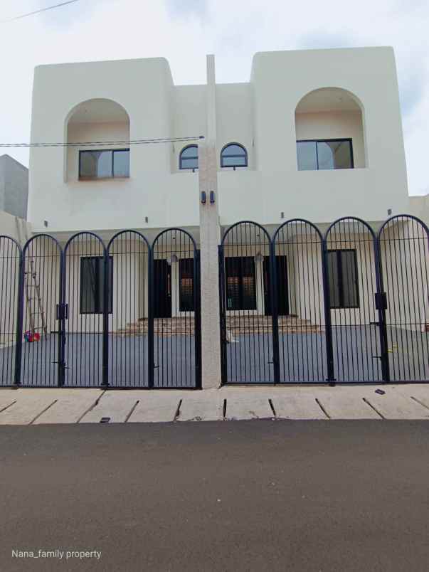 dijual rumah jalan raya kelapa dua