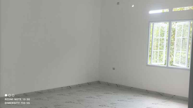 dijual rumah jl raya jatiwaringin