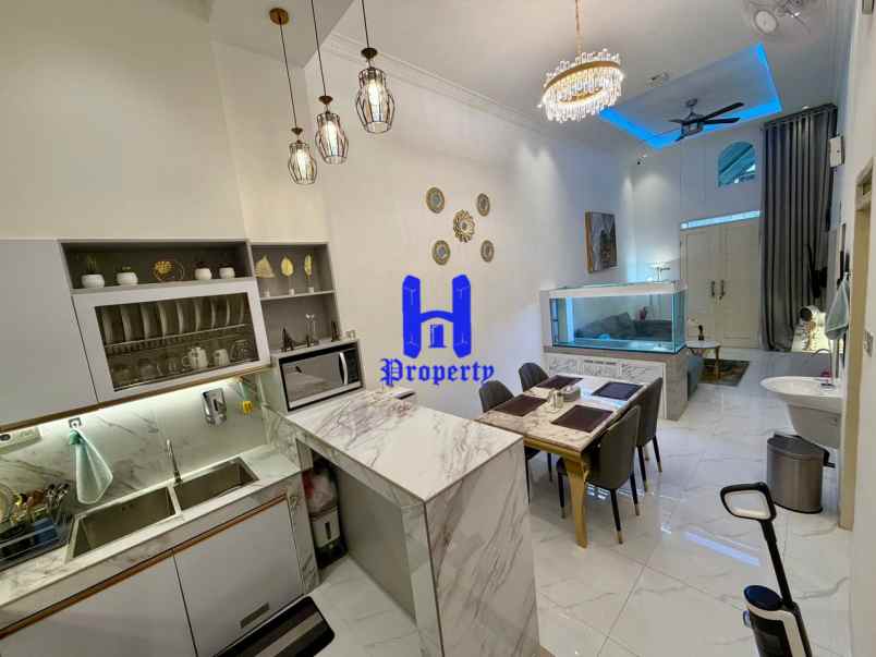 dijual rumah komplek griya manhattan