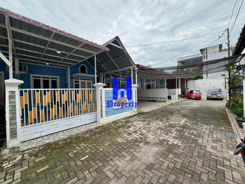 dijual rumah komplek griya manhattan