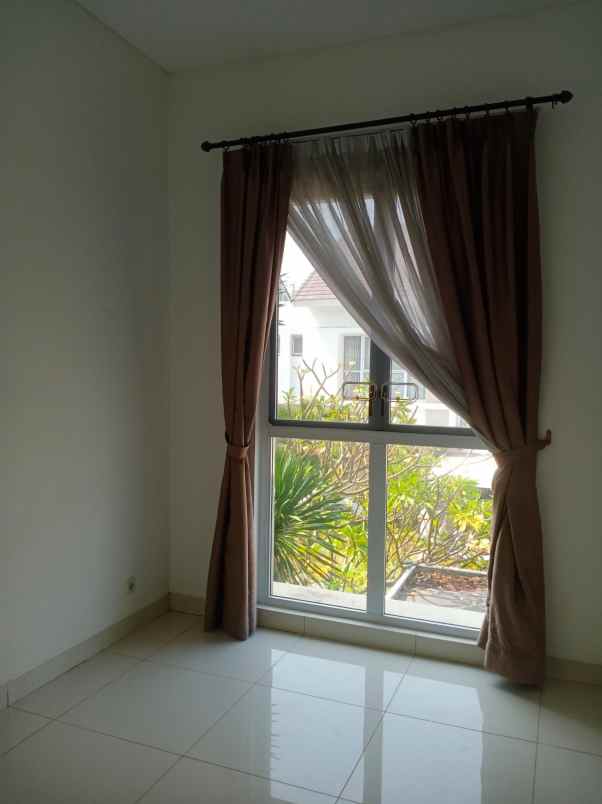 disewakan rumah cluster palm spring jgc