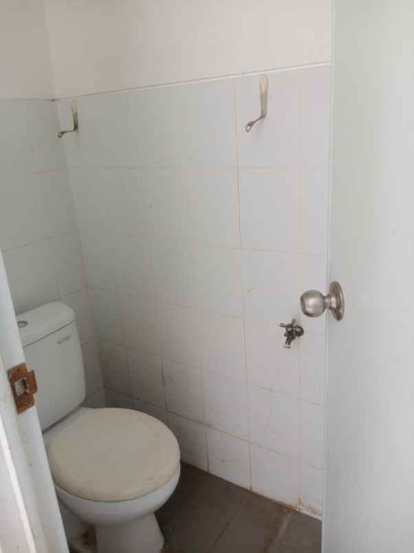 disewakan rumah cluster palm spring jgc