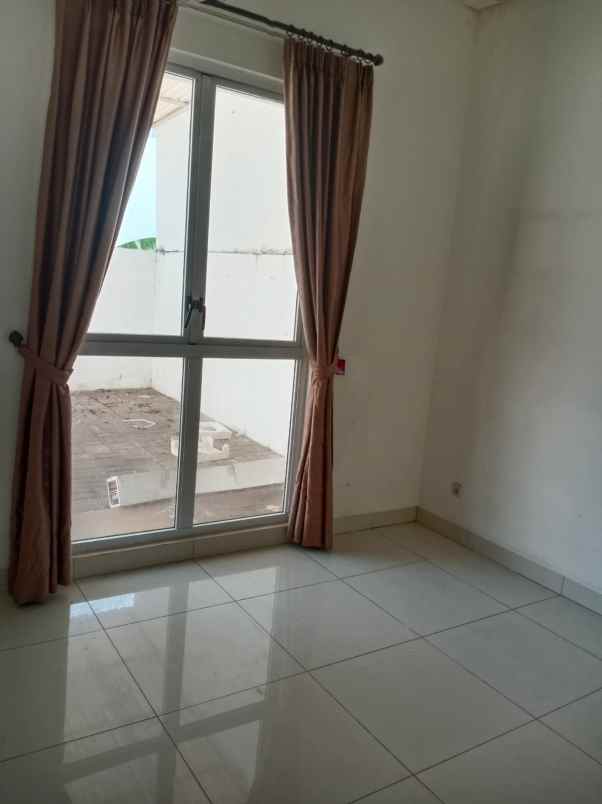 disewakan rumah cluster palm spring jgc