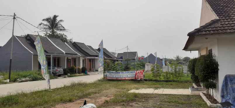 rumah jl lurah madi no 6 kp