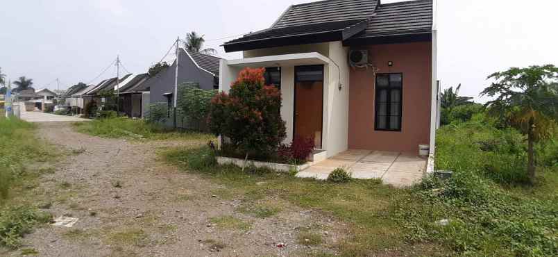 rumah jl lurah madi no 6 kp