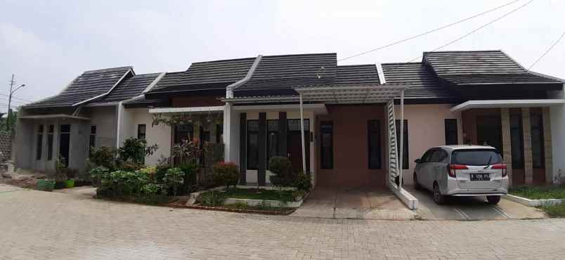 rumah jl lurah madi no 6 kp