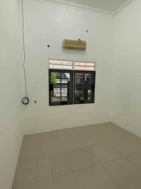 rumah manyar jaya strategis minimalis siap huni