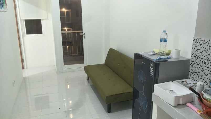 apartemen puncak dharmahusada 2br semi furnish