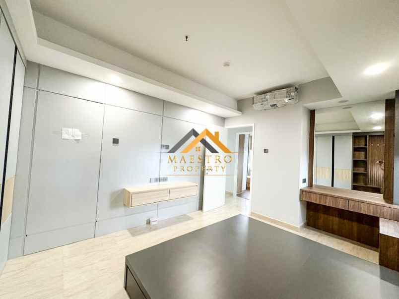 dijual apartemen podomoro city deli tower