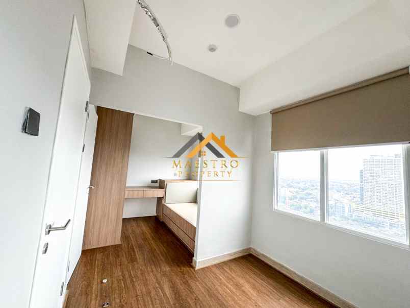 dijual apartemen podomoro city deli tower
