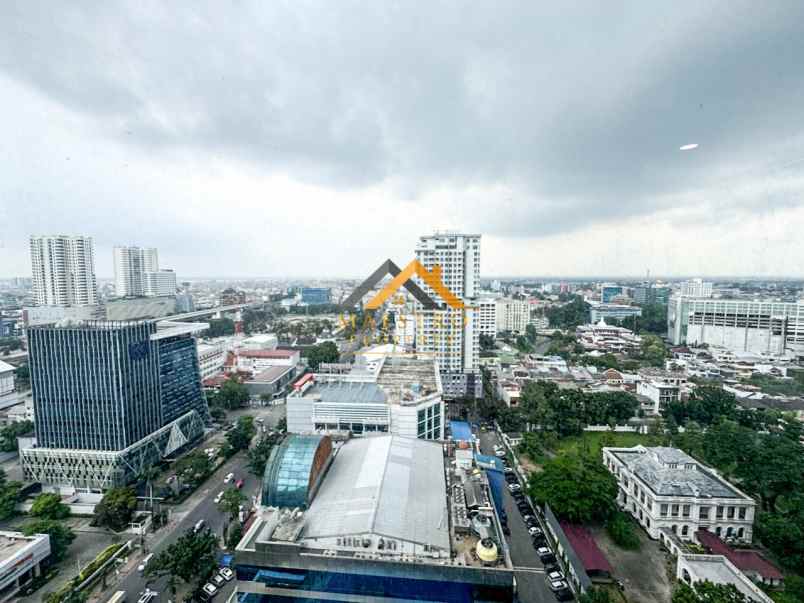 dijual apartemen podomoro city deli tower