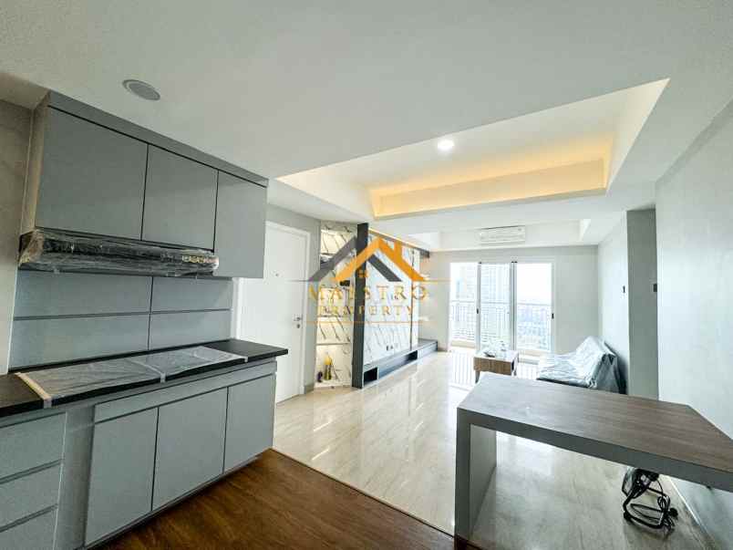 dijual apartemen podomoro city deli tower