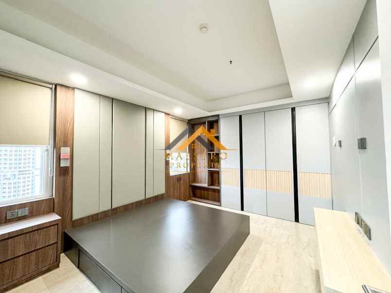dijual apartemen podomoro city deli tower