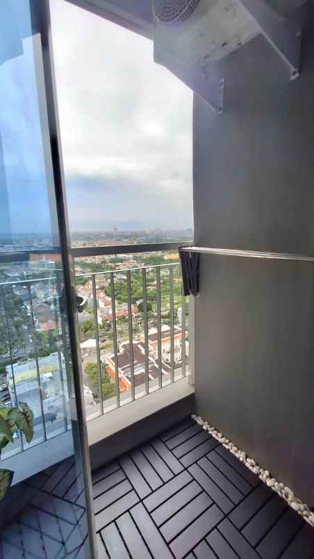 dijual rumah bella pakuwon city