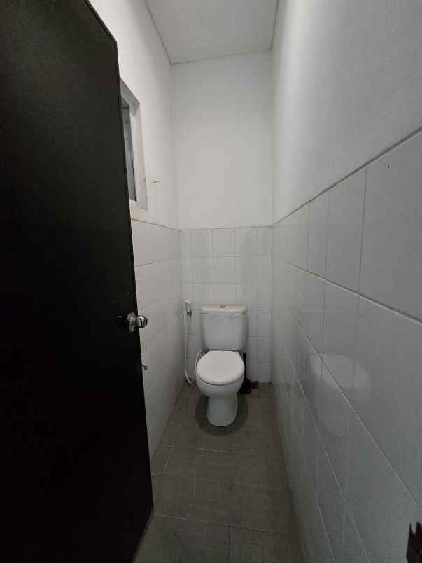 dijual rumah cluster palm spring jgc