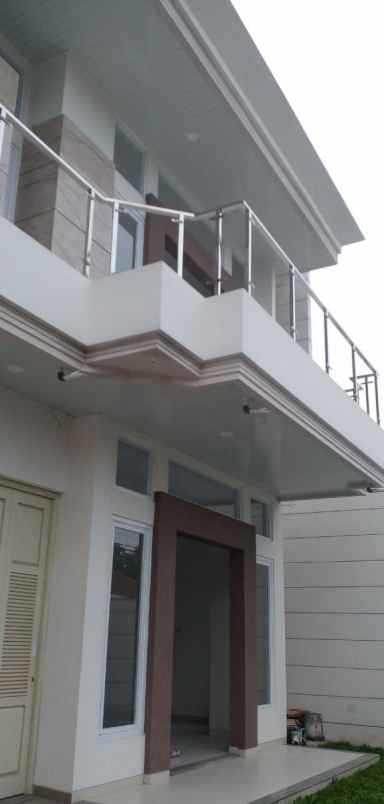 dijual rumah dharmahusada indah barat