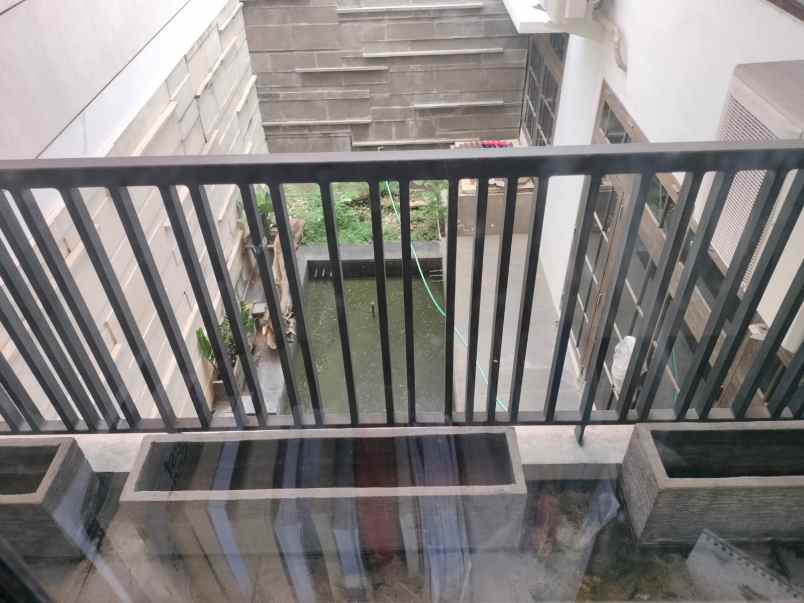 dijual rumah dharmahusada indah barat