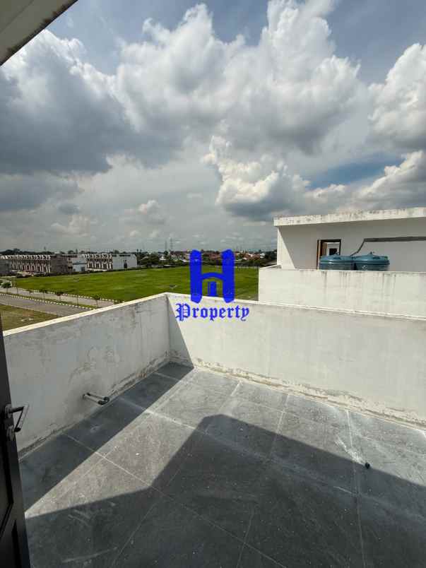 dijual rumah di komplek green park type orchid medan