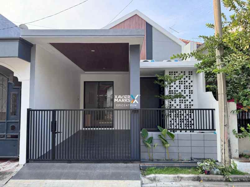 dijual rumah griya asri pakuwon city