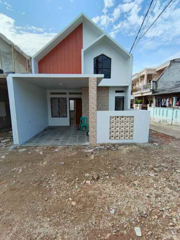 dijual rumah jl kodau raya pondok