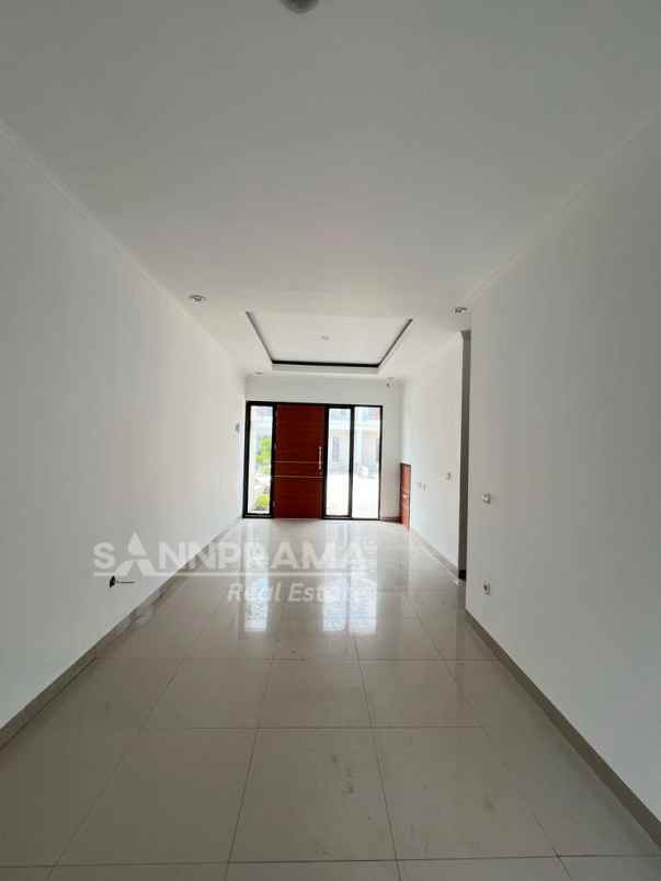 dijual rumah jln raya harjamukti