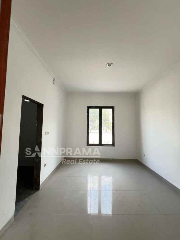 dijual rumah jln raya harjamukti