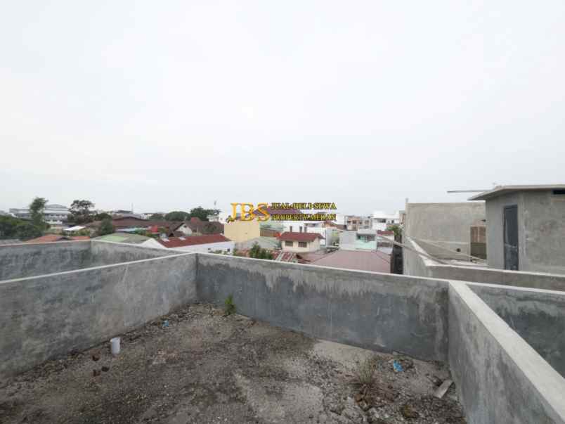 dijual rumah komplek harmoni regency