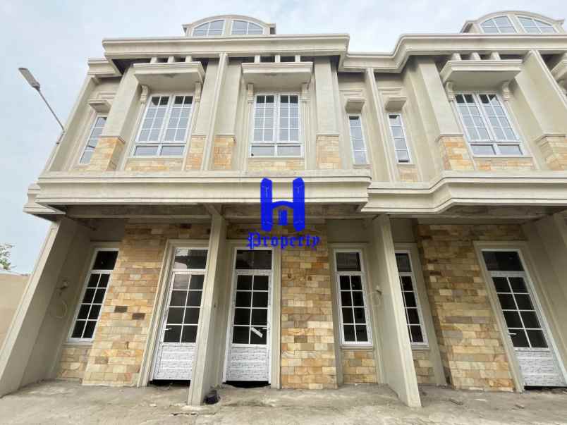 dijual rumah komplek harmoni regency