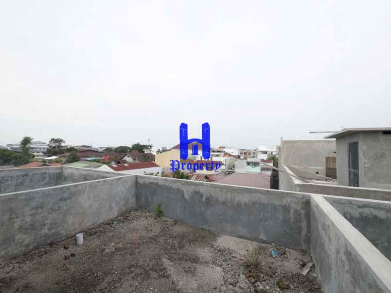 dijual rumah komplek harmoni regency