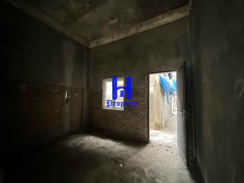 dijual rumah komplek harmoni regency