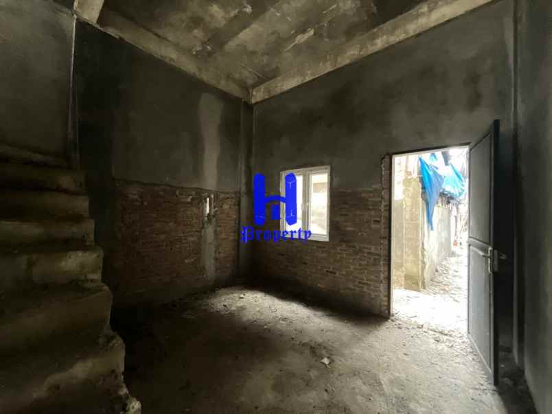 dijual rumah komplek harmoni regency