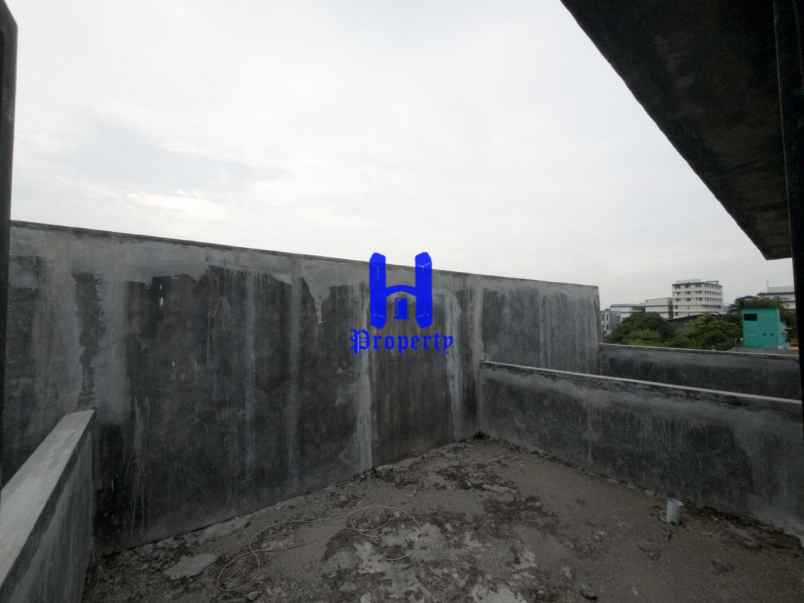 dijual rumah komplek harmoni regency