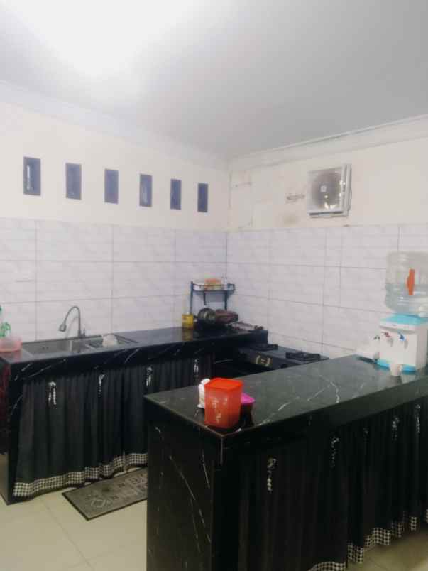 dijual rumah komplek menteng garden