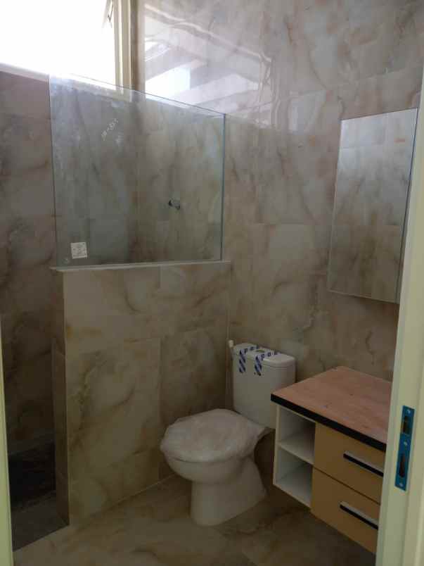 dijual rumah raya greenwood golf araya