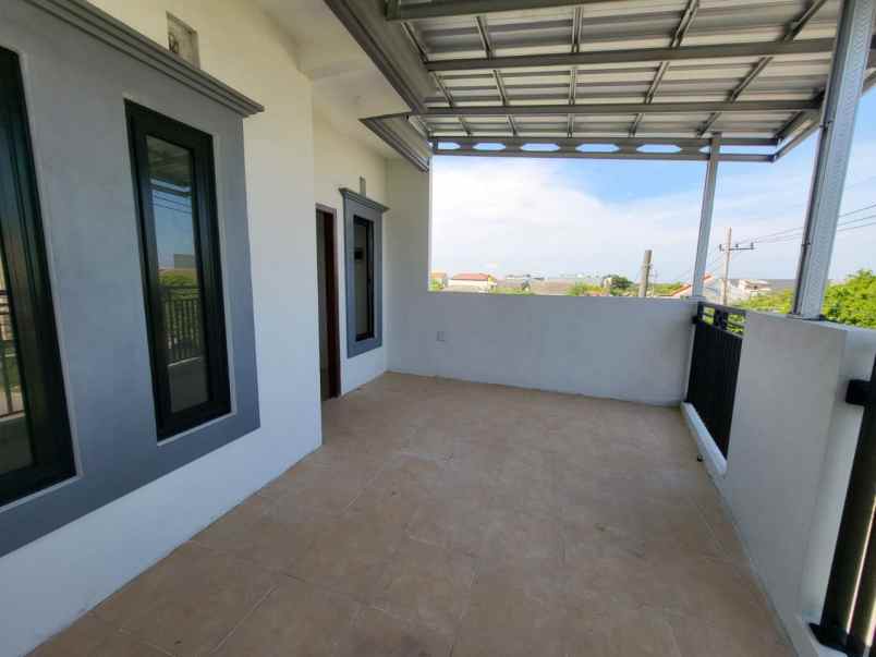 dijual rumah raya medokan