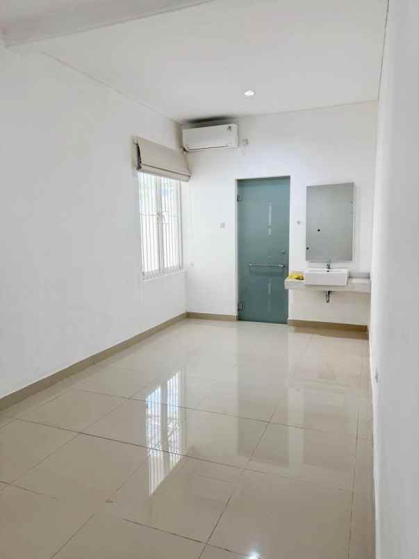 dijual rumah wiguna tengah