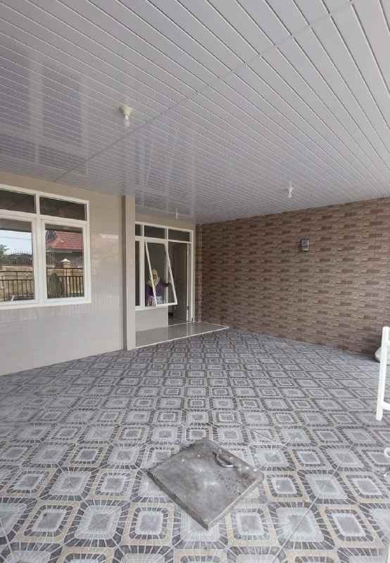 disewakan rumah pantai mentari