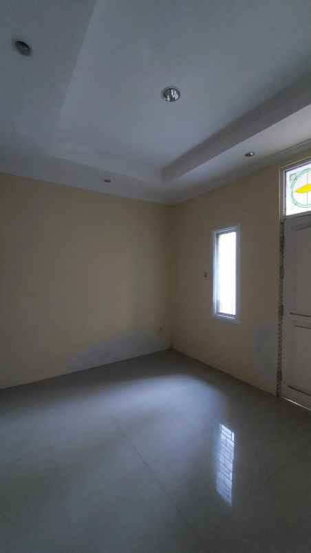disewakan rumah pantai mentari