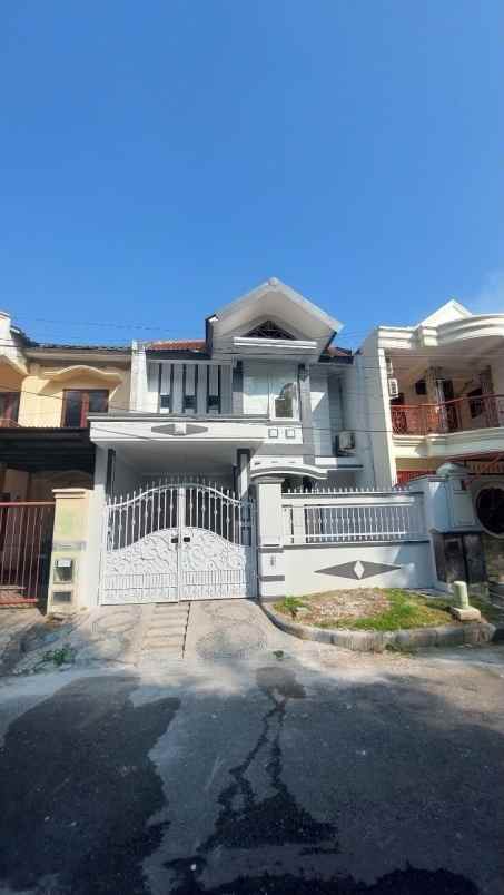 disewakan rumah pantai mentari