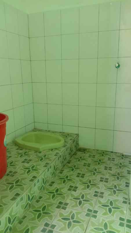 disewakan rumah perum teluk akses jalan utama