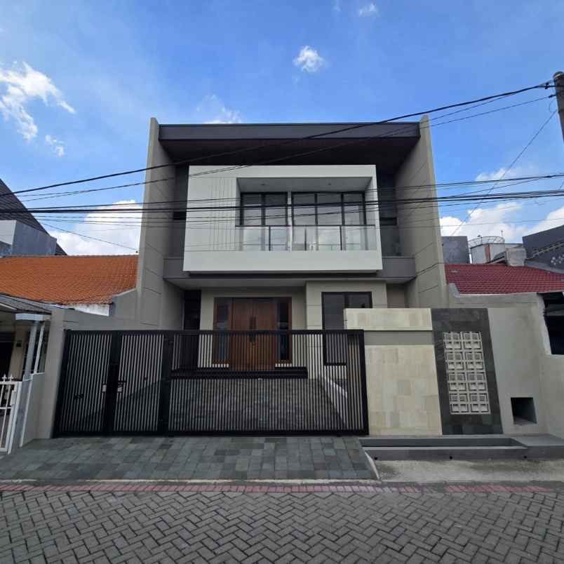 rumah manyar new minimalis row 2 5 mobil