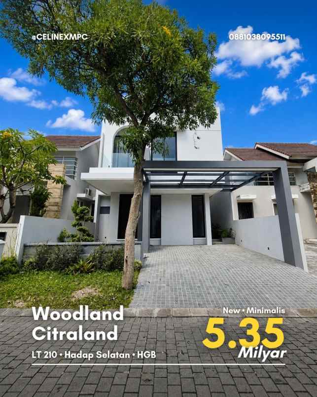 rumah woodland citraland new minimalis carport