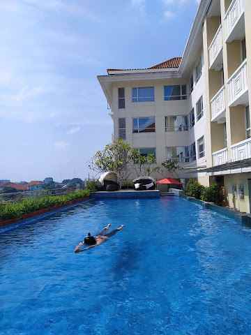 dijual hotel jalan margomulyo