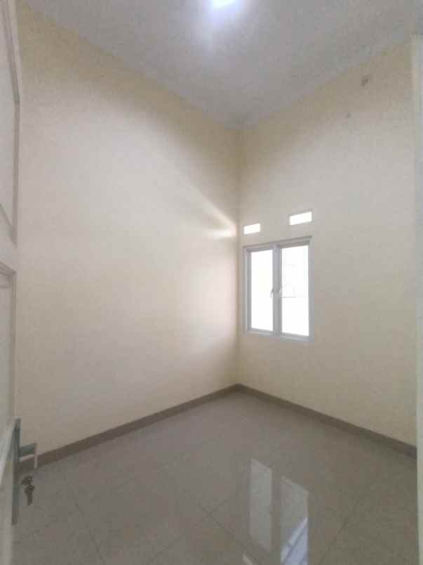 dijual rumah bumi anggrek bekasi