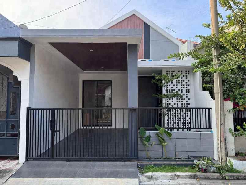 dijual rumah cantik griya asri pakuwon city