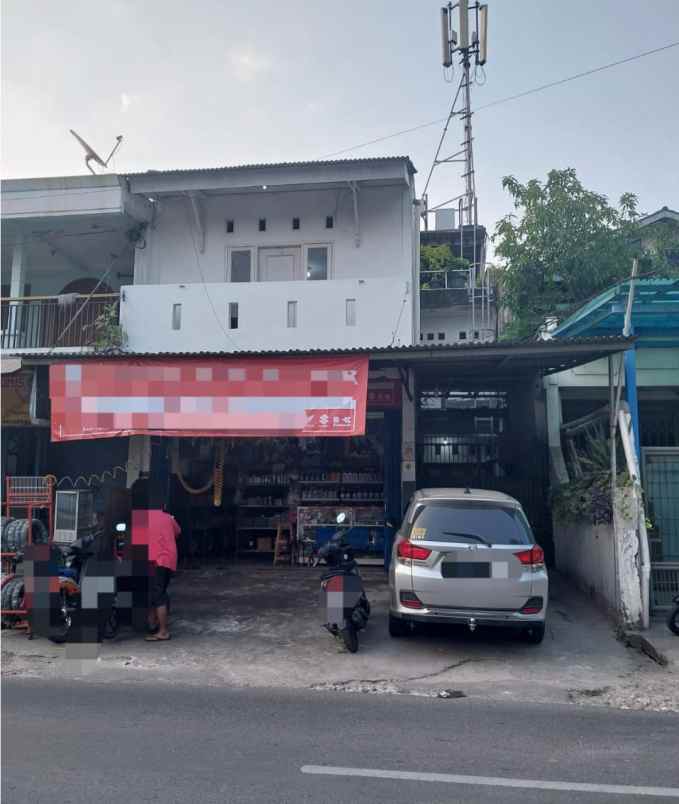 dijual rumah jalan raya karang tengah