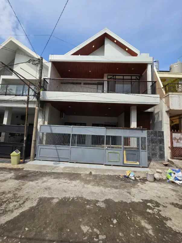 dijual rumah jl babatan pantai barat