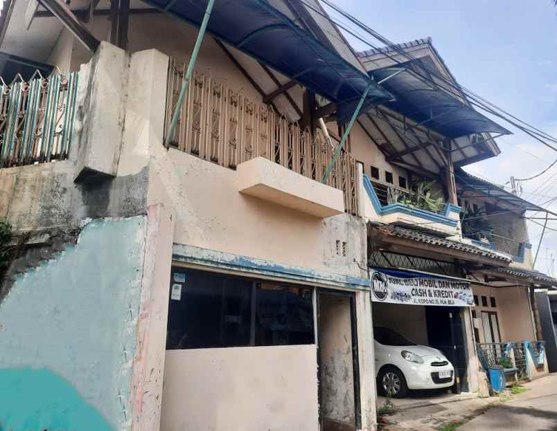 dijual rumah jl kopo no 17 kel beji kec